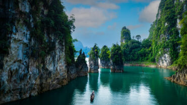 A Cheow Lan Lake boat tour through limestone karsts, the top thing to do in Khao Sok