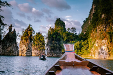 Cheow Lan Lake at golden hour, when the overnight tour in Khao Sok pays off over a quick day trip